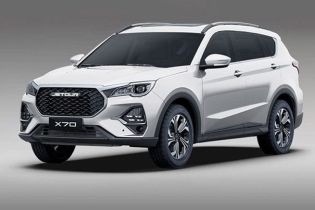 The Jetour X70 SUV, in a sleek white finish, features a bold grille, modern headlights, and stylish alloy wheels, embodying a blend of rugged design and urban sophistication.