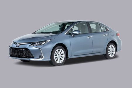 Full view of a 2025 Toyota Corolla, showing the front grille, headlights, and wheels.