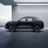 A black Jetour Dsashing in a modern, minimalist indoor space.
