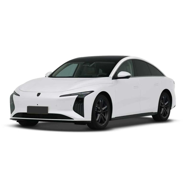 A white electric sedan with a sleek, modern design, featuring a black roof, distinctive headlights, and black alloy wheels, presented against a plain white background.