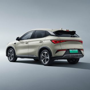 Side and rear view of a light-colored BYD Yuan Plus electric SUV.
