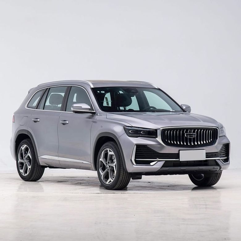 Front side view of a silver Geely SUV.