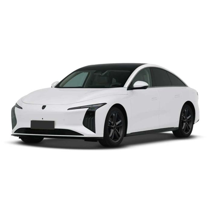 A white electric sedan with a sleek, modern design, featuring a black roof, distinctive headlights, and black alloy wheels, presented against a plain white background.
