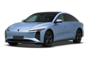 A light blue electric sedan with a sleek, modern design, featuring a black roof, distinctive headlights, and black alloy wheels, presented against a plain white background.