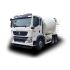 A white HOWO concrete mixer truck with a large rotating drum.