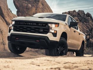 2026 Chevrolet Silverado LD Trail Boss driving through the canyons