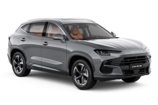 A gray Jetour Dashing SUV with orange interior seats.