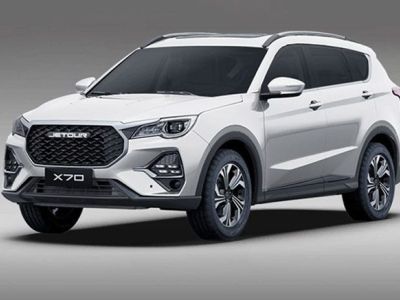 The Jetour X70 SUV, in a sleek white finish, features a bold grille, modern headlights, and stylish alloy wheels, embodying a blend of rugged design and urban sophistication.