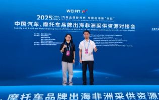 Two people posing at the Supply and Purchase Matchmaking Event of Chinese Automotive and Motorcycle Brands into the African Market.