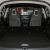 Trunk space of a car with seats folded down.