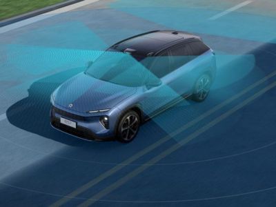 Blue electric SUV with a semi-transparent blue sensor field, showcasing advanced driver-assistance systems on the road.