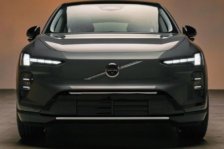 Head-on shot of new Volvo EX60 EV smooth front fascia with emblem