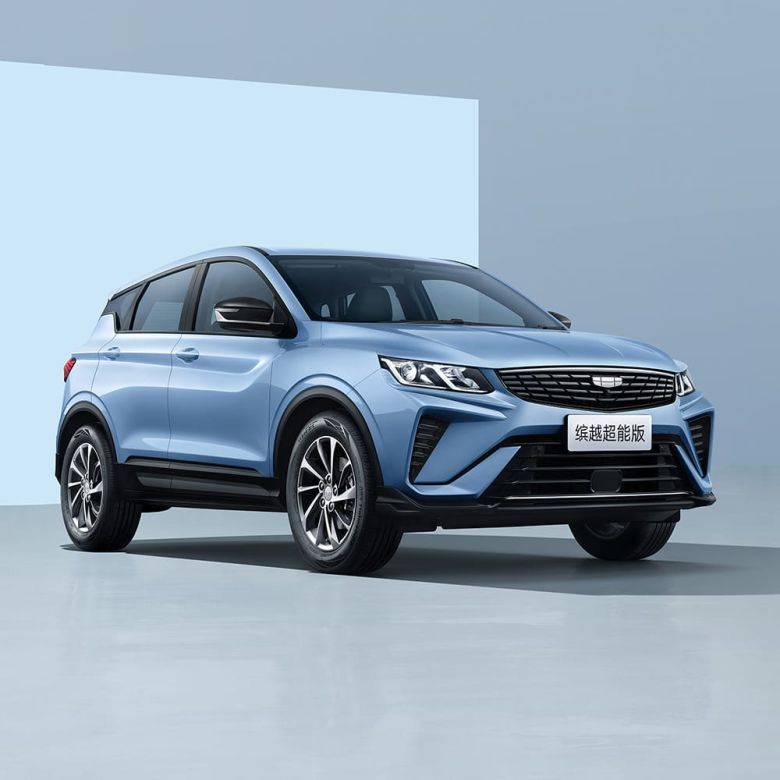 A light blue Geely SUV in a studio setting.