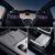 Collage of car interior details: rear seat screens, wireless charging pad, and an open storage compartment.