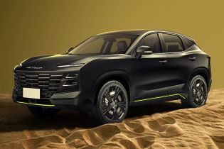 Black Jetour SUV in a desert landscape.