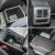 Collage of four car interior details: storage space, air vent, cup holder area, and a folded seat part.