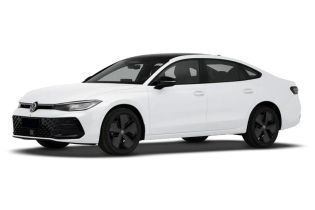A sleek white Volkswagen sedan with black wheels and a modern design.