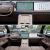 Two views of the interior of a Xpeng car, showcasing the dashboard with dual screens, steering wheel, and center console.
