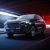 A black Jetour Dashing SUV driving in a tunnel with dynamic lighting.