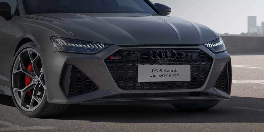 Front view of the Audi RS 6 Avant performance, highlighting its aggressive grille and badging.