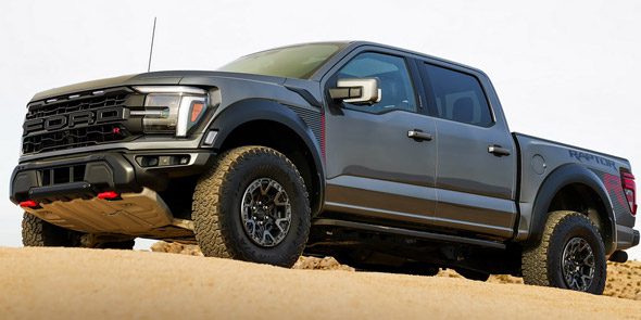 2025 Ford F-150 Raptor R truck in Carbonized Gray Metallic parked in the desert