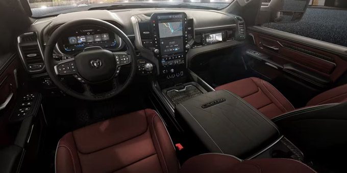 Display The steering wheel and driver seat in the 2026 Ram Limited.