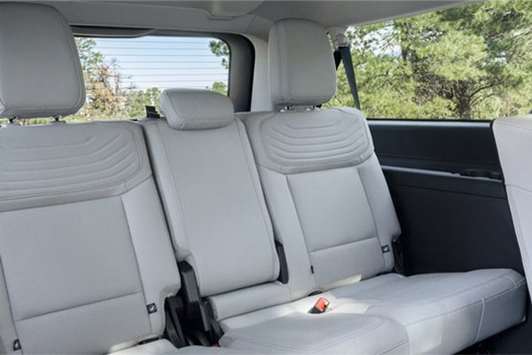 2026 Ford Expedition Platinum SUV rear seating area with a seat folded flat