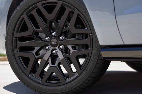 2026 Ford Expedition Platinum SUV with Stealth Performance Package 24-inch x 9.5-inch Ebony-painted aluminum wheel