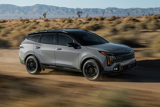 2026 Kia Sportage in gray three-quarter front passenger side view