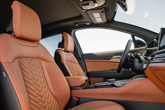 2026 Kia Sportage interior side view of the front cabin