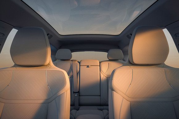 The panoramic roof and all five seats in the 2026 Volvo EX60 viewed from the front