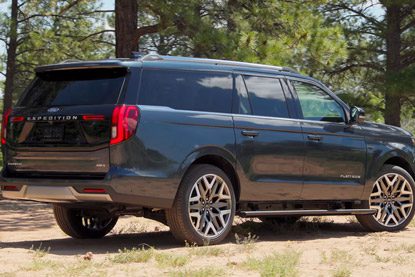 Parked 2026 Ford Expedition King Ranch SUV with power deployable running boards