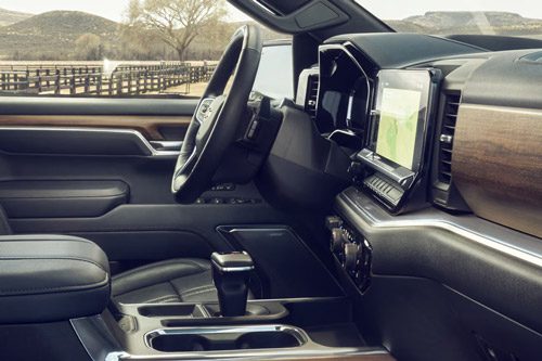 Side view of the front interiors of the 2026 Chevrolet Silverado LD Crew Cab