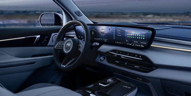 Buick modern interior: Sleek curved panoramic display, minimalist dashboard, and premium materials for a futuristic driving experience.
