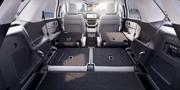 The cargo area of a 2026 Ford Explorer SUV with the rear seats folded down