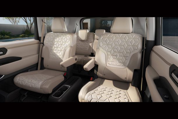 2026 Nissan Armada NISMO beige seven seat captain chairs luxury interior