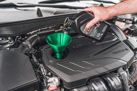 Adding engine oil to a car
