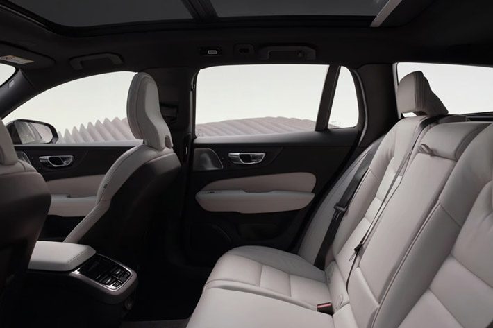 The 2026 Volvo V60 Cross Country’s leather-upholstered split-folding back passenger seats and rear center console.
