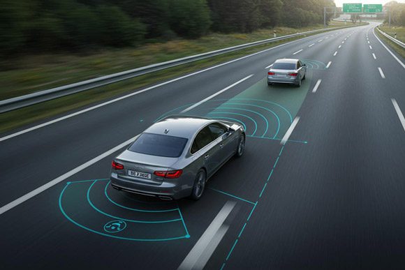A car using cruise control on the highway
