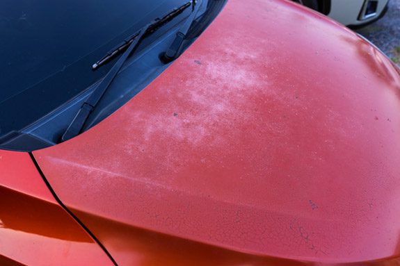 Car paint exposed to the sun in hot weather