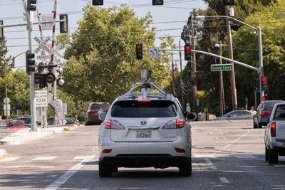 Cars gliding to the red light stop