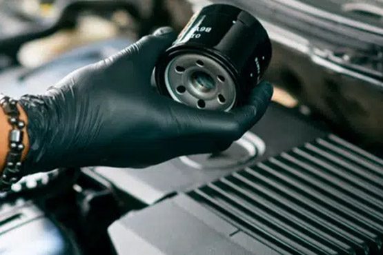Change the oil filter before storing the car for an extended period