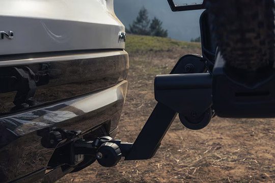 Close-up View of the Hitch on the 2026 GMC Terrain AT4 Small Off-Road SUV Driving Through the Forest