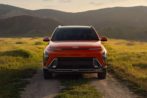 Front view of the 2026 Hyundai Kona Limited in Orange Pearl