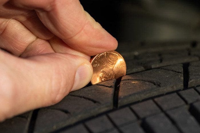 Tire tread depth coin test