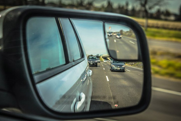 Check your rearview mirrors regularly while driving