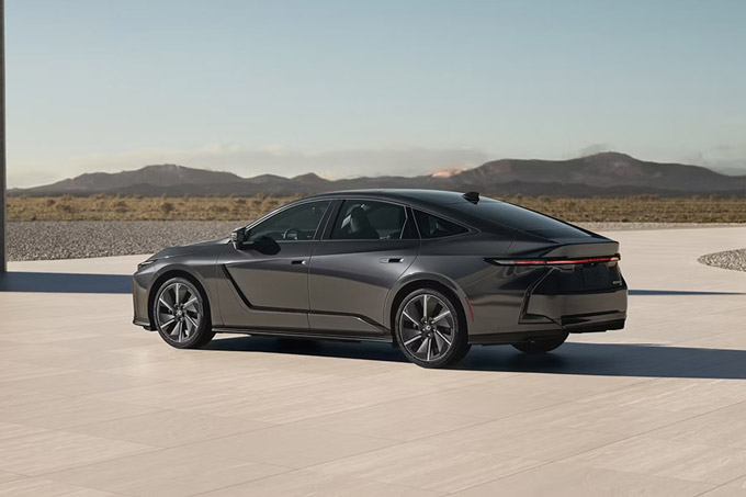 Rear three-quarter view of the 2026 Lexus ES 500e Premium in Cloudburst Grey